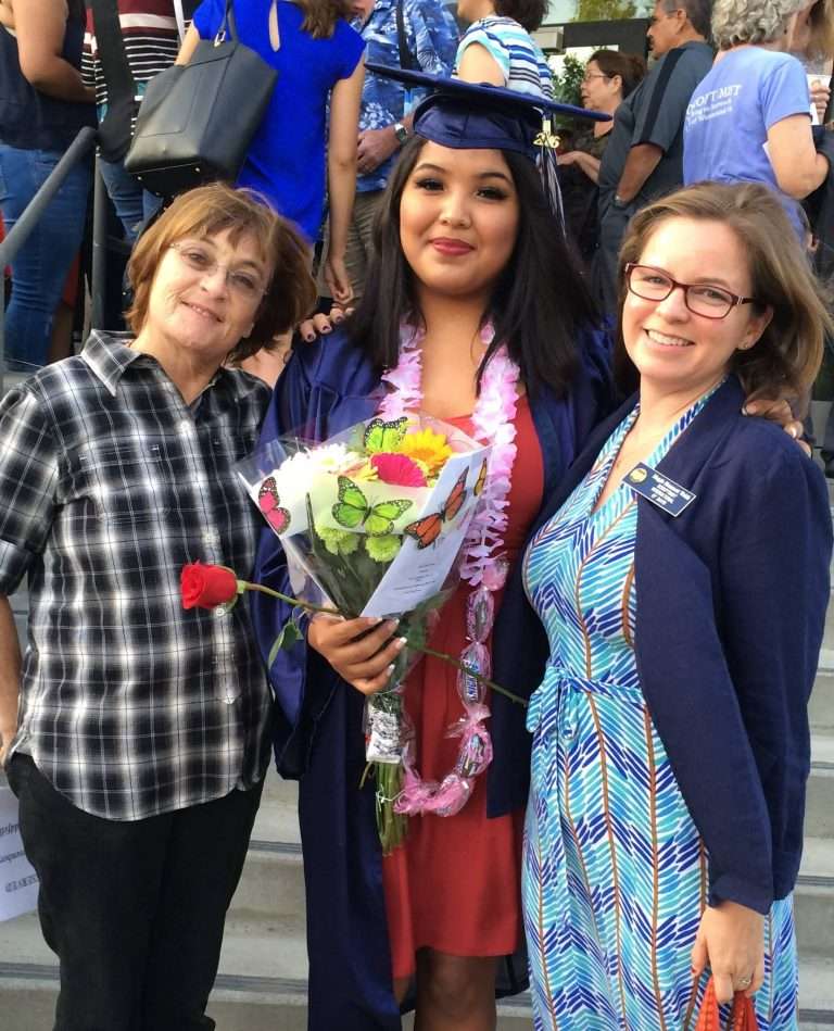 SI Davis members celebrate a scholarship recipient at graduation